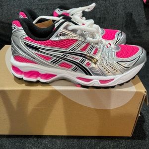 ASICS sneaker size youth 4 but, also can fit a womens size 6